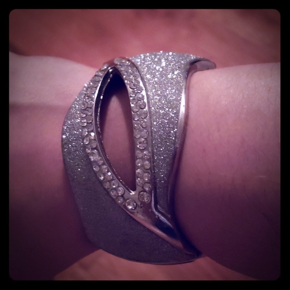 Silver cuff bracelet.